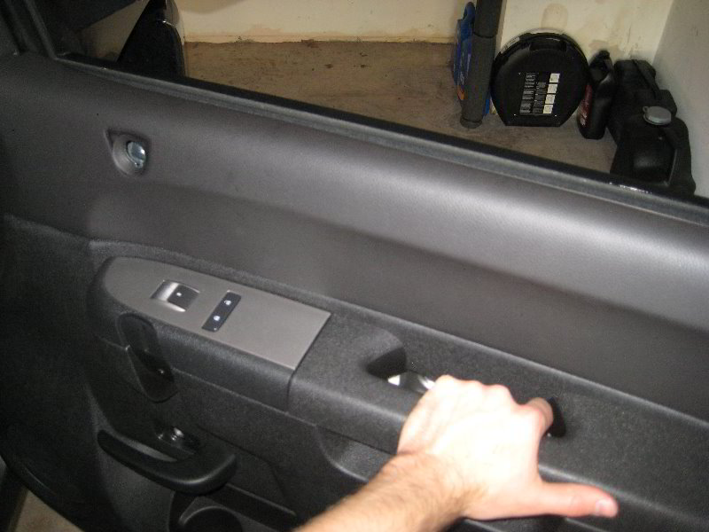 How do you replace a Chevy Silverado door panel?