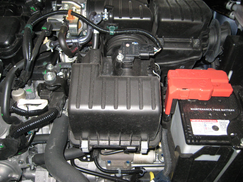 Change engine air filter honda fit #7