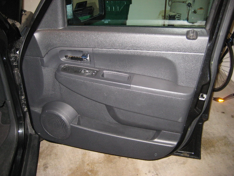 How to remove jeep liberty door panel #3