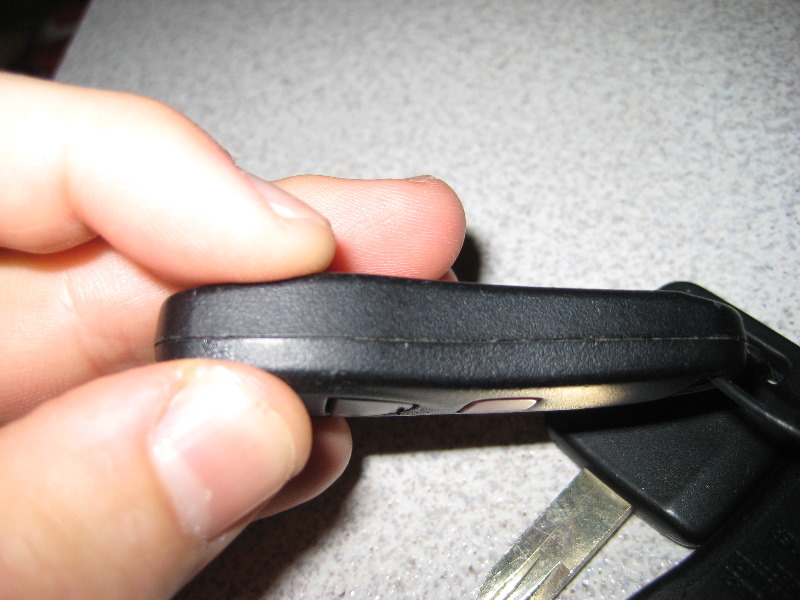 How to change battery in nissan versa key fob #8