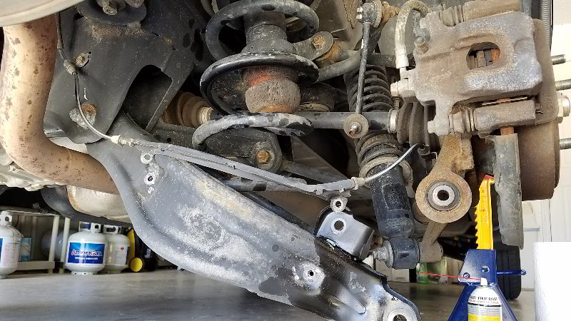 Honda-Pilot-Rear-Coil-Spring-Bump-Stop-Replacement-Guide-017