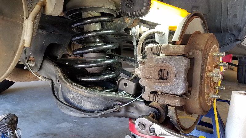 Honda-Pilot-Rear-Coil-Spring-Bump-Stop-Replacement-Guide-034