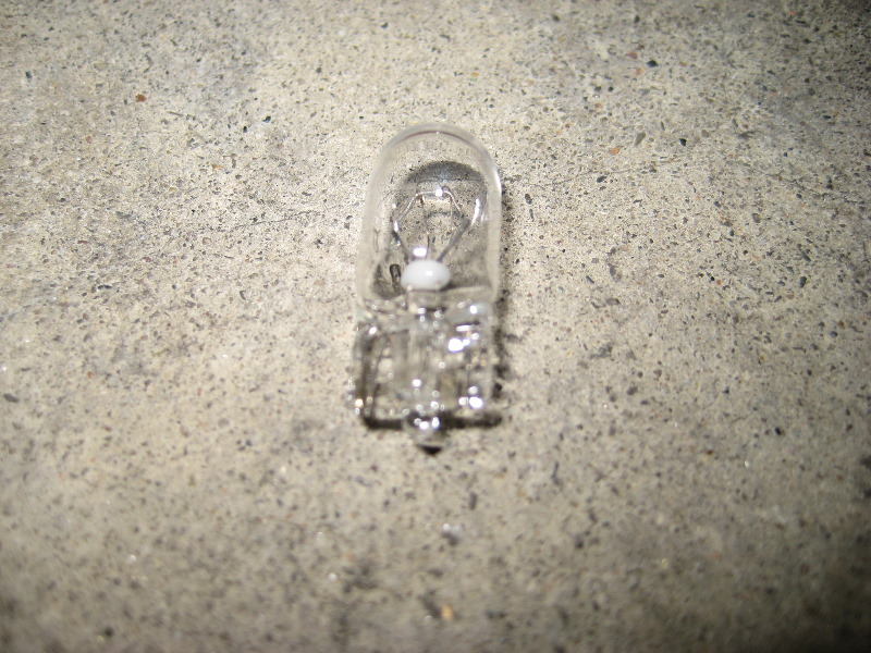 2013-2015-Nissan-Altima-Door-Courtesy-Step-Light-Bulb-Replacement-Guide-008