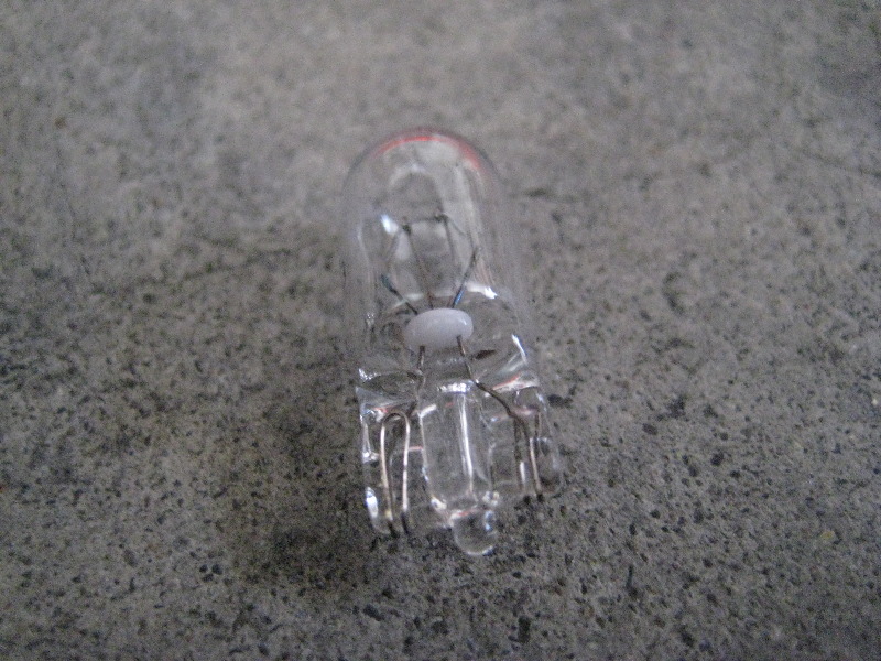 2013-2015-Nissan-Altima-Door-Courtesy-Step-Light-Bulb-Replacement-Guide-009