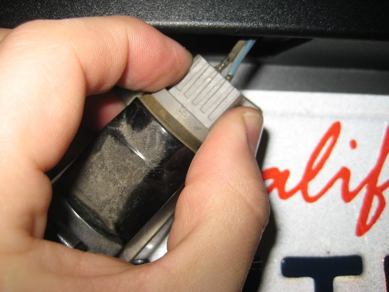 Chrysler-200-License-Plate-Light-Bulbs-Replacement-Guide-011