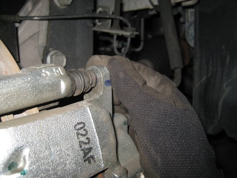 Chrysler-Town-and-Country-Front-Brake-Pads-Replacement-Guide-030