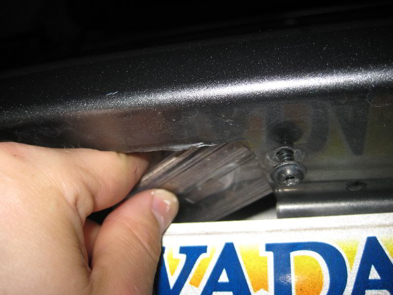 Dodge-Avenger-License-Plate-Light-Bulb-Replacement-Guide-014