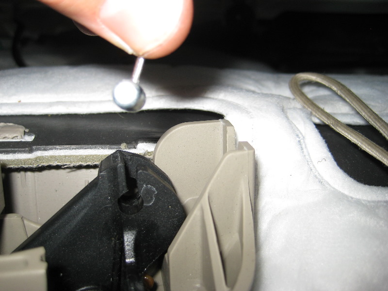 how to repair door panel fabric in ford escape