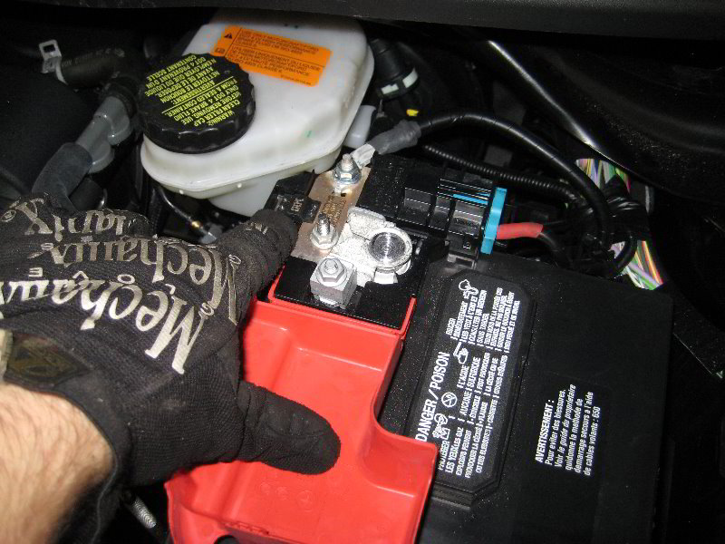 How to change a dead 12 volt car battery in the engine bay of a 5th generat...
