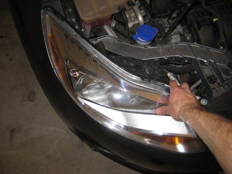 Replacing headlight bulb ford focus 2002 #1