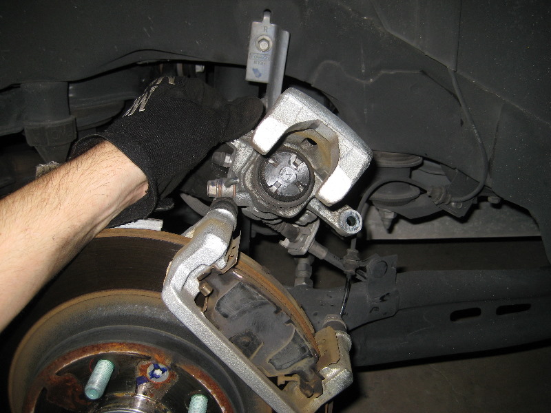 Replacing brake pads ford fusion #6