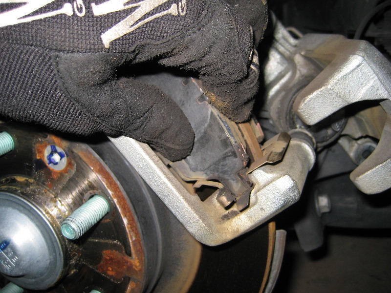 Replacing brake pads ford fusion #8