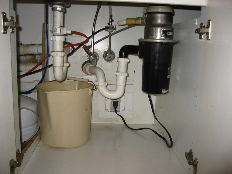 repair leaking kitchen sink drain