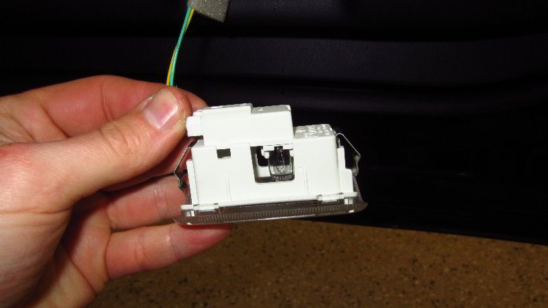 Infiniti-QX60-Door-Panel-Courtesy-Step-Light-Bulb-Replacement-Guide-015