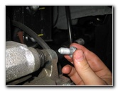 Kia-Sedona-Front-Brake-Pads-Replacement-Guide-011