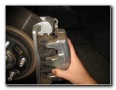 Kia-Sedona-Front-Brake-Pads-Replacement-Guide-013