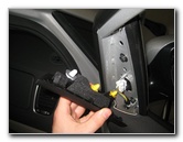 Kia-Sedona-Interior-Door-Panel-Removal-Guide-037