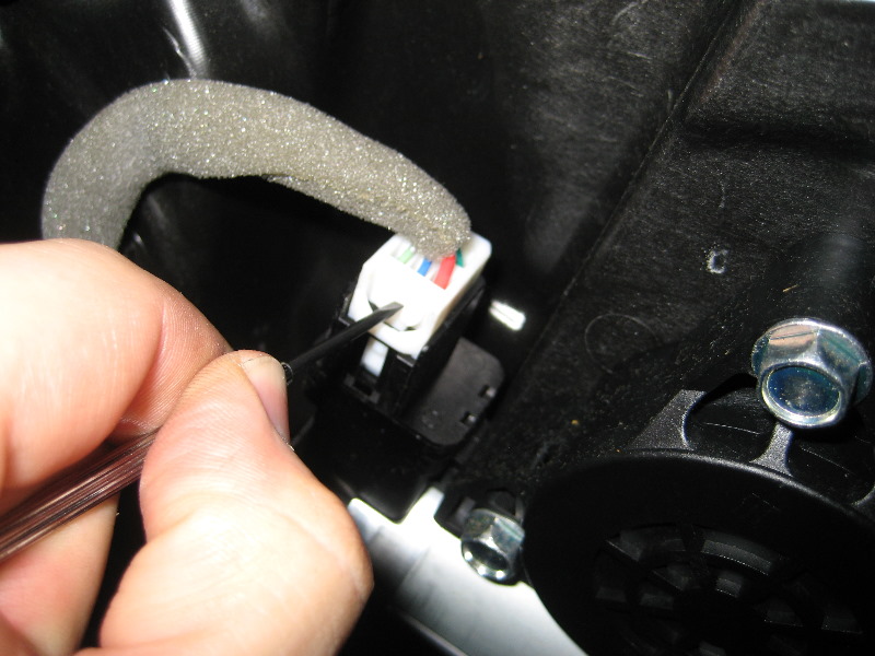 Mazda-CX-9-Front-Door-Panel-Removal-Guide-031