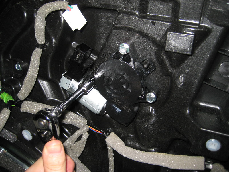 Mazda-CX-9-Front-Door-Panel-Removal-Guide-033