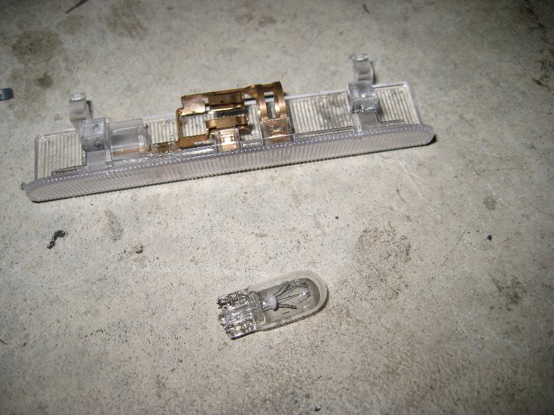 NissanArmadaDoorStepCourtesyLightBulbReplacementGuide006