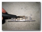 Nissan-Armada-Door-Step-Courtesy-Light-Bulb-Replacement-Guide-005