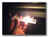 Nissan-Armada-Door-Step-Courtesy-Light-Bulb-Replacement-Guide-009