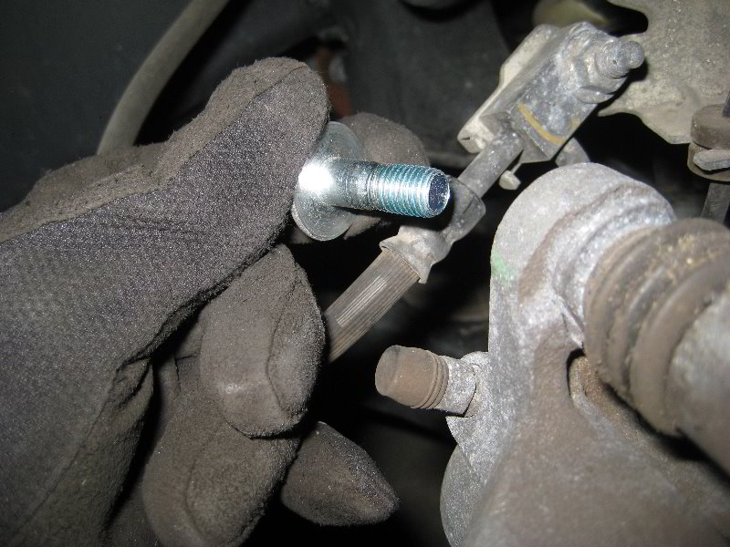 Nissan-Armada-Front-Brake-Pads-Replacement-Guide-011