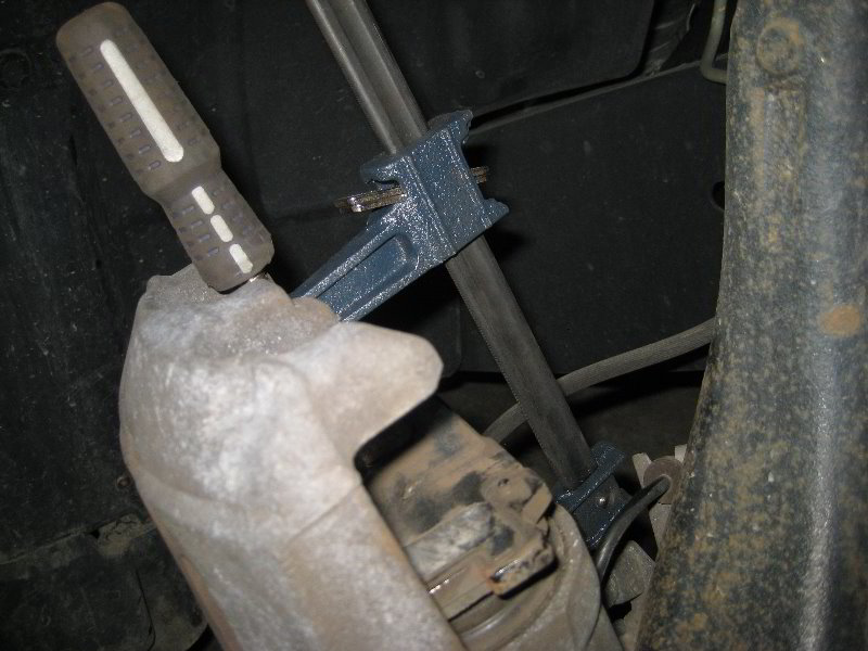 Nissan-Armada-Front-Brake-Pads-Replacement-Guide-021