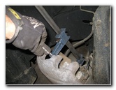 Nissan-Armada-Front-Brake-Pads-Replacement-Guide-023