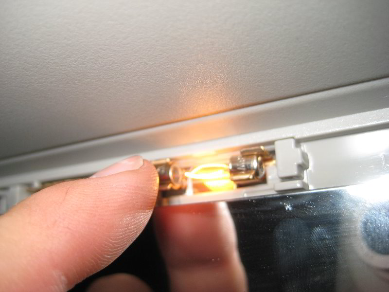 Nissan-Armada-Vanity-Mirror-Light-Bulb-Replacement-Guide-008