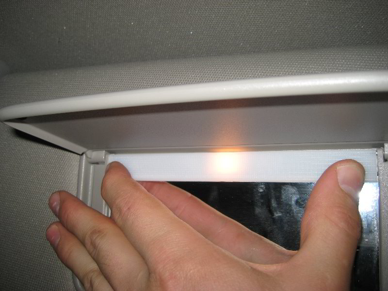 Nissan-Armada-Vanity-Mirror-Light-Bulb-Replacement-Guide-011