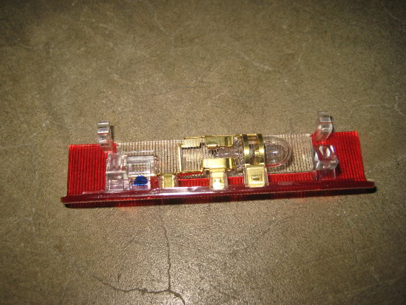 Nissan-Maxima-Door-Panel-Courtesy-Step-Light-Bulb-Replacement-Guide-007