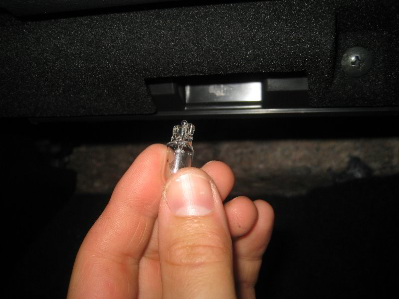 Nissan-Maxima-Front-Passenger-Footwell-Light-Bulb-Replacement-Guide-005